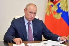 Russia President Vladimir Putin chairs a video meeting of the Pobeda (Victory) organising committee at the Novo-Ogaryovo state residence outside Moscow on July 2, 2020, as he thanked Russians today after a nationwide vote approved controversial constitutional reforms that allow him to extend his rule until 2036. (Photo credit: ALEXEI DRUZHININ/Sputnik/AFP via Getty Images)