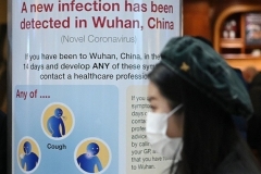 A warning sign in London’s Heathrow Airport last January. (Photo by Daniel Leal-Olivas/AFP via Getty Images)