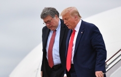 President Donald Trump and Attorney General William Barr step off Air Force One following a trip to Kenosha, Wisconsin on Sept. 1, 2020. (Photo by MANDEL NGAN/AFP via Getty Images)