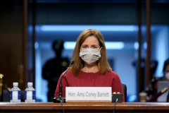 Supreme Court nominee Amy Coney Barrett listens during a confirmation hearing before the Senate Judiciary Committee. (Photo credit: SUSAN WALSH/POOL/AFP via Getty Images)