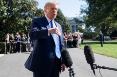 President Donald Trump speaks to the press as he departs the White House in Washington, DC, on October 15, 2020. - Trumps travels to North Carolina, Florida and Georgia for campaign stops on October 15 and 16. (Photo by SAUL LOEB/AFP via Getty Images)