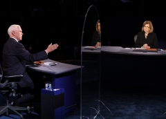 U.S. Vice President Mike Pence (L) speaks as moderator and Washington bureau chief for USA Today Susan Page looks on during the vice presidential debate. (Photo credit: JUSTIN SULLIVAN/POOL/AFP via Getty Images)