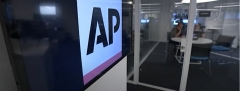 Featured is part of an Associated Press bureau. (Photo credit: YouTube/AP Archive)