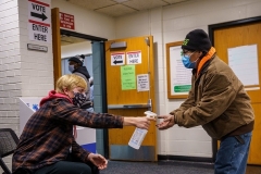 Voting in the age of COVID: Hand sanitizer is made available to voters in Minneapolis, Minnesota on November 3, 2020. (Photo by KEREM YUCEL/AFP via Getty Images)