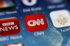 Pictured is the CNN app on a smartphone. (Photo credit: Hoch Zwei/Corbis via Getty Images)