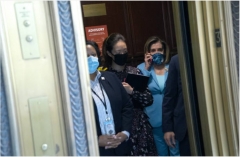 Speaker Pelosi in an elevator in the Senate Russell Office Building. (Stefani Reynolds/Bloomberg via Getty Images)