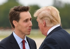 President Donald Trump speaks with Josh Hawley, now the U.S. Senator from Missouri, in Springfield, Mo. on Sept. 21, 2018. (Photo by MANDEL NGAN/AFP via Getty Images)