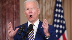 President Joe Biden speaks at the State Department on Thursday. (Photo by Saul Loeb/AFP via Getty Images)