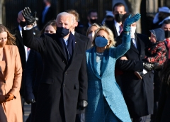 President Joe Biden, First Lady Jill Biden, and their family walk up Pennsylvania Avenue towards the White House. (Photo credit: MANDEL NGAN/AFP via Getty Images)