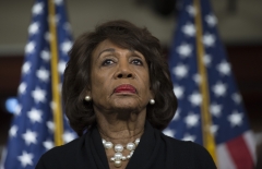 Rep. Maxine Waters (D-CA) looks on before speaking to reporters regarding the Russia investigation. (Photo credit: ANDREW CABALLERO-REYNOLDS/AFP via Getty Images)