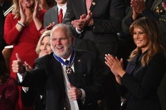 Radio personality Rush Limbaugh gives a thumbs-up after being awarded the Medal of Freedom by First Lady Melania Trump after being acknowledged by US President Donald Trump as he delivers the State of the Union address. (Photo credit: MANDEL NGAN/AFP via Getty Images)