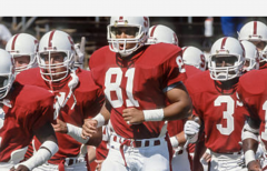 Cory Booker, 81, jogs onto the field at Stanford for a game in the 1989 season. (Photo by David Madison/Getty Images)