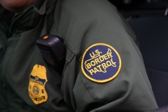 This photo shows a patch on a Border Patrol agent's uniform in McAllen, Tex. (Photo credit: SUZANNE CORDEIRO/AFP via Getty Images)