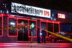 Law enforcement personnel are seen outside a massage parlor where a person was shot and killed on March 16, 2021, in Atlanta, Ga. (Photo credit: ELIJAH NOUVELAGE/AFP via Getty Images)