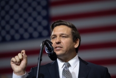 Ron DeSantis speaks during a rally with former President Donald Trump. (Photo credit: SAUL LOEB/AFP via Getty Images)