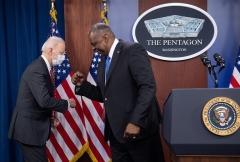 President Joe Biden elbow bumps US Secretary of Defense Lloyd Austin during a visit to the Pentagon on February 10, 2021. (Photo by SAUL LOEB/AFP via Getty Images)