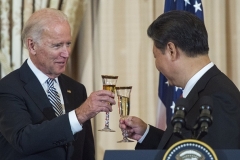 Then-Vice President Joe Biden and Chinese President Xi Jinping toast during a State Luncheon for China on September 25, 2015 at the US State Department. (Photo by PAUL J. RICHARDS/AFP via Getty Images)
