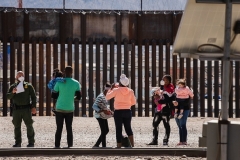 Border Patrol agents apprehend a group of migrants near downtown El Paso, Texas following the congressional border delegation visit on March 15, 2021. (Photo by JUSTIN HAMEL/AFP via Getty Images)