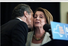 New York Governor Andrew Cuomo greets House Minority Leader Nancy Pelosi at an event at New York University (NYU) where Cuomo signed into law a new affirmative sexual consent policy to combat campus sexual violence on July 7, 2015 in New York City. Joined by Minority Leader Nancy Pelosi, local politicians, survivors of abuse and area activists, the bill includes a ‘yes means yes’ definition of consent requiring a clear and affirmative agreement between sexual partners. (Photo by Spencer Platt/Getty Images)