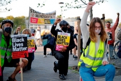 Protesters outside the U.S. Embassy in London, England last fall. (Photo by Tolga Akmen/AFP via Getty Images)