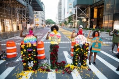 Black Lives Matter protesters demonstrate on a street. (Photo credit: Noam Galai/Getty Images)
