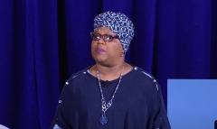 Dr. Chanequa Walker-Barnes, author of “Prayer of a Weary Black Woman,” gives a speech. (Photo credit: YouTube/TheoEd Talks)
