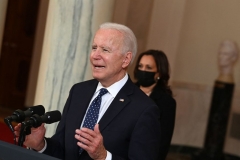 Vice President Kamala Harris (R) listens as US President Joe Biden delivers remarks on the guilty verdict against former policeman Derek Chauvin at the White House in Washington, DC, on April 20, 2021. (Photo by BRENDAN SMIALOWSKI/AFP via Getty Images)
