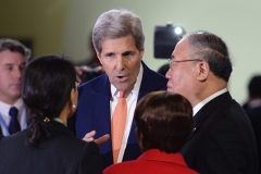 Then-Secretary of State John Kerry and China’s climate change envoy Xie Zhenhua, right, at the talks that produced the Paris climate accord in December 2015. (Photo by Miguel Medina/AFP via Getty Images)