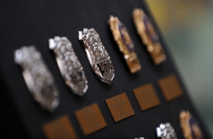 Pictured is a special exhibition of 29 police badges belonging to members of the New York City Police Department who assisted rescue efforts at Ground Zero and later died from 9/11 related illnesses. (Photo credit: JEWEL SAMAD/AFP via Getty Images)