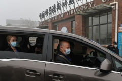 Peter Daszak (R), Thea Fischer (L) and other members of the World Health Organization (WHO) team investigating the origins of the COVID-19 coronavirus, arrive at the Wuhan Institute of Virology in Wuhan in China's central Hubei province on February 3, 2021. (Photo by HECTOR RETAMAL/AFP via Getty Images)