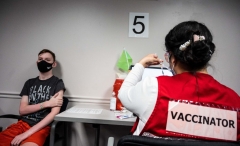 Luke Allan, 13, waits to receive a Covid-19 vaccination at the Fairfax Government Center vaccination clinic in Fairfax, Virginia on May 13, 2021. - The campaign to immunize America's 17 million adolescents aged 12-to-15 kicked off in full force on May 13, a key part of President Joe Biden's strategy to push the country close to herd immunity. (Photo by ANDREW CABALLERO-REYNOLDS/AFP via Getty Images)