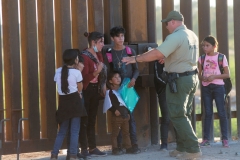 United States Border Patrol agents detain families from Central and South America who have been crossing into the United States from Mexico to ask for asylum, April 30, 2021 outside of Yuma, Arizona. (Photo by Andrew Lichtenstein/Corbis via Getty Images)
