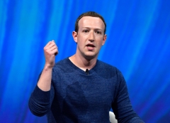 Facebook Founder and CEO Mark Zuckerberg gives a presentation. (Photo credit: GERARD JULIEN/AFP via Getty Images)