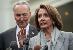 House Speaker Nancy Pelosi (D-CA) and Senate Majority Leader Chuck Schumer (D-NY) give an address. (Photo credit: SAUL LOEB/AFP via Getty Images)