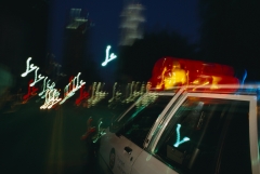 Featured is a police car with flashing lights. (Photo credit: David Butow/Corbis via Getty Images)