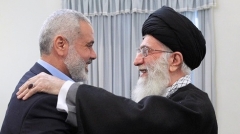 Iranian supreme leader Ayatollah Ali Khamenei and Hamas leader Ismail Haniyeh. (Photo by khamenei.ir/AFP via Getty Images)
