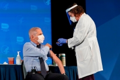 Dr. Anthony Fauci, director of the National Institute of Allergy and Infectious Diseases, receives his first dose of the Covid-19 vaccine at the National Institutes of Health on December 22, 2020. (Photo by PATRICK SEMANSKY/POOL/AFP via Getty Images)