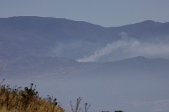 A picture taken from the northern Iraeli Kibbutz of Misgav Am shows smoke billowing from the southern Lebanese border village of Kfar Shuba, on May 18, 2021, following overnight Israeli shelling after rockets were fired from Lebanon into Israel. (Photo by JALAA MAREY/AFP via Getty Images)