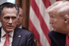 Sen. Mitt Romney (R-Utah) appears with then-President Donald Trump with whom he had a chilly relationship. (Photo by BRENDAN SMIALOWSKI/AFP via Getty Images)
