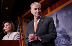 House Speaker Nancy Pelosi (D-CA) and Senate Majority Leader Chuck Schumer (D-NY) give an address. (Photo credit: MANDEL NGAN/AFP via Getty Images)