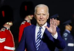 President Joe Biden waves on arrival at Cornwall Airport Newquay, near Newquay, Cornwall, on June 9, 2021. (Photo by PHIL NOBLE/POOL/AFP via Getty Images)
