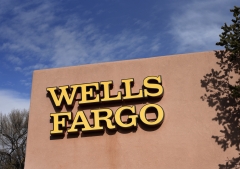 Featured is the outside of a Wells Fargo bank. (Photo credit: Robert Alexander/Getty Images)