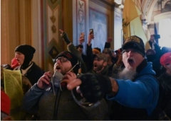 Rioters inside the U.S. Capitol, Jan. 6, 2021. (Photo by Roberto Schmidt/AFP via Getty Images)