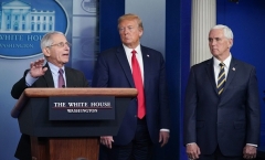 Director of the National Institute of Allergy and Infectious Diseases Anthony Fauci, flanked by  President Donald Trump and Vice President Mike Pence, speaks during the daily briefing on the novel coronavirus on April 22, 2020. (Photo by MANDEL NGAN/AFP via Getty Images)