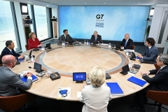 G7 leaders pose at the opening of their summit in Cornwall. (Photo by Leon Neal / Pool /AFP via Getty Images)