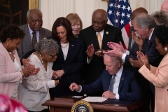 President Joe Biden signs the Juneteenth National Independence Day Act on June 17, 2021. (Photo by JIM WATSON/AFP via Getty Images)