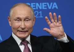 Russian President Vladimir Putin holds a news conference after his talks with President Joe Biden in Geneva on June 16, 2021. (Photo by Mikhail Svetlov/Getty Images)