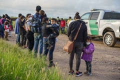 U.S. Border Patrol agents process illegal immigrants who crossed into the United States in Penitas, Texas on July 8, 2021. (Photo by PAUL RATJE/AFP via Getty Images)