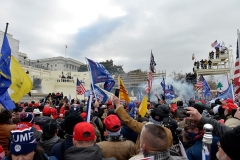 Supporters of President Donald Trump clash with police and security forces at the Capitol on January 6, 2021. (Photo by JOSEPH PREZIOSO/AFP via Getty Images)