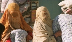 Afghan women in Kabul in 1996, wearing Taliban-imposed burqas. (Photo by Emmanuel Dunand/AFP via Getty Images)